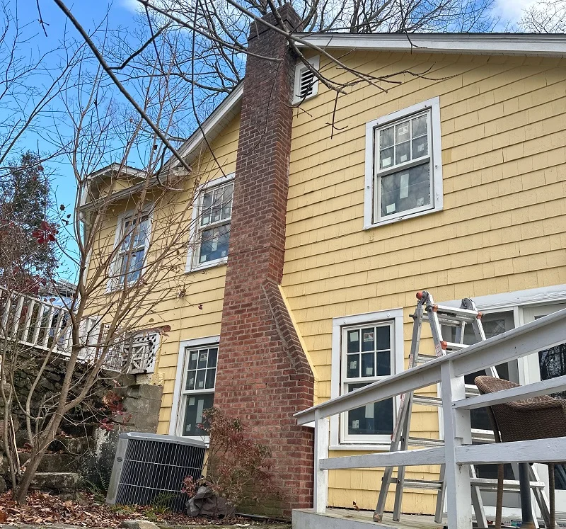 Andersen Woodwright double hungs with FDL grids top sash only